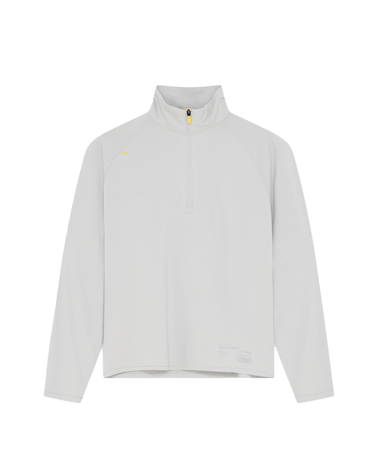 Copper-Dura® Limitless 1-4 Zip Long Sleeve transparent flatlay